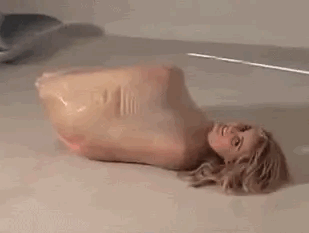 Hure-Anna-Rosenmuller-gefangen-in-Latex.gif
